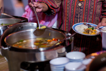 Food Buffet Catering Dining Eating Party Sharing Concept.people group catering buffet food indoor in luxury restaurant with meat colorful fruits and vegetables