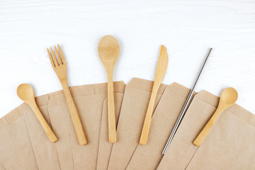 Eco friendly bamboo cutlery set on paper background. Zero waste concept.