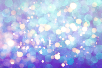 Obraz premium Blue festive background with sparkles in the bokeh. The concept of the celebration, the day of St. Valentine, New Year, birthdays, ceremonies, events, etc.
