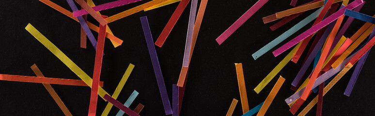 top view of multicolored abstract lines isolated on black background, connection and communication concept