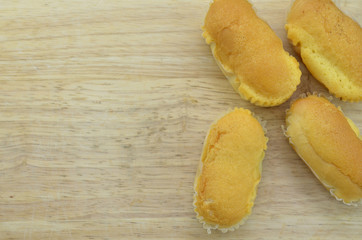 Delicious bread on a wooden background. Top view