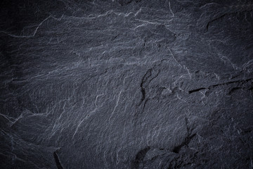 Dark grey and black slate background or texture