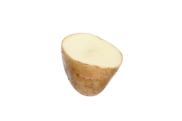 Half a fresh, washed potato tuber is isolated on a white background.