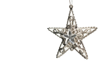 Silver star to decorate the Christmas tree. Isolate on white