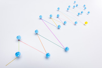 colorful connected drawn lines with pins, connection and leadership concept