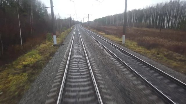 train view from the rear window of the last car timelapse autumn