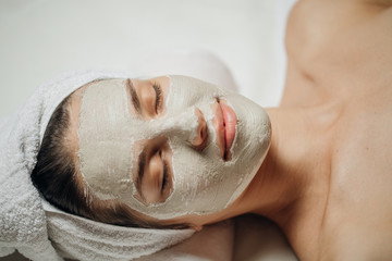 Beautiful Woman with a Facial Mask