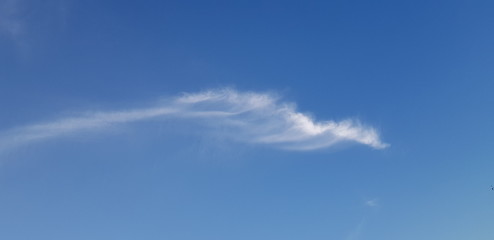 white clouds in the blue sky