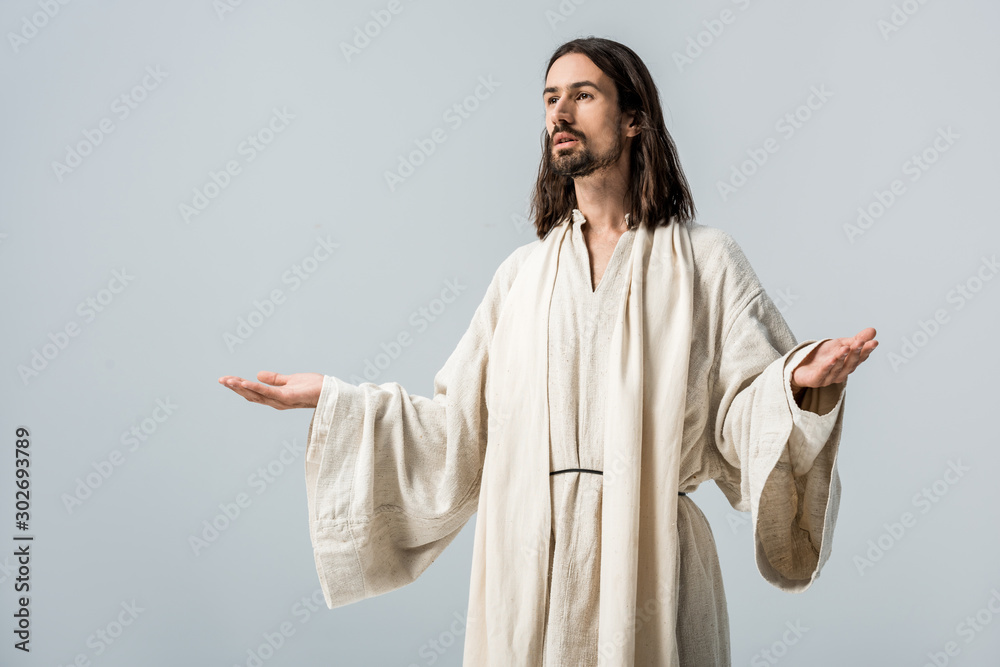 Poster religious man with outstretched hands standing isolated on grey