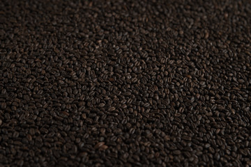 Wheat chocolat for alcohol production. Roasted wheat background. Top view