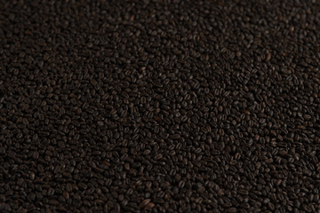 Fototapeta premium Wheat chocolat for alcohol production. Roasted wheat background. Top view