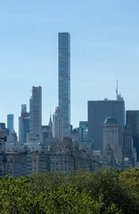 Foto op Plexiglas New York skyscrapers over Central Park trees © chechotkin