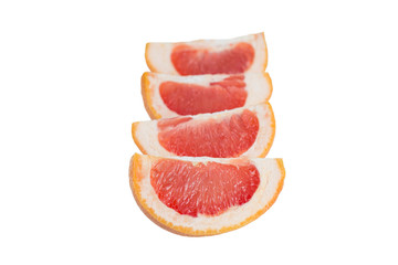 Close-up of four slices of a ripe pink grapefruit (Citrus paradisi) in line, isolated on white background.