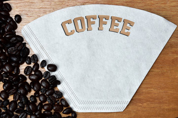 roasted coffee beans on the table with the word cafe