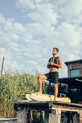 Handsome Young Man Kayaking