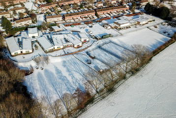 Aerial View Of Buildings In Snow