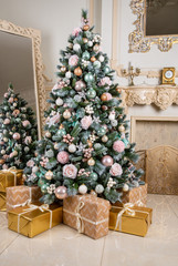 Christmas tree with pink pines and multicolored balls