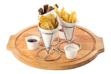 assorted beer snacks rye bread croutons, nachos, french fries with sauces isolated on white background