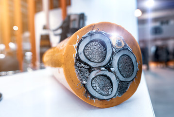 Three-core high-voltage cable with cutaway insulation