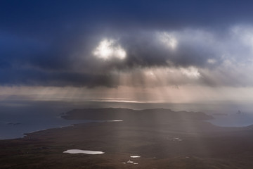 Fototapeta na wymiar Stormy sky and coast seen from Ronas Hill, highest point of the Shetland Islands, rising 450 meters above sea level
