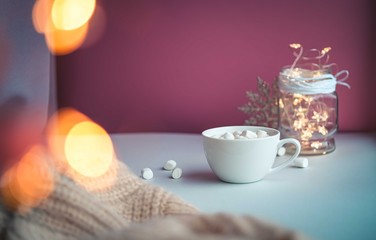 Warm cocoa with marshmellows.