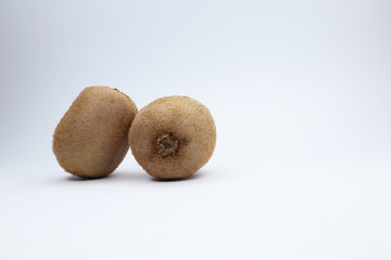 juicy kiwi on a white background. funny smiley with fruits