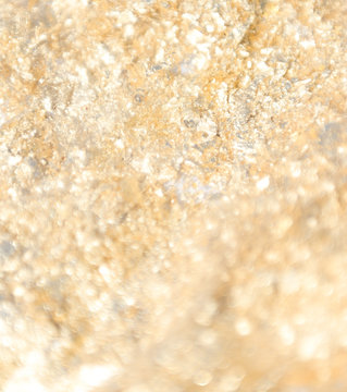 gilted gold confetti sparkle close up
