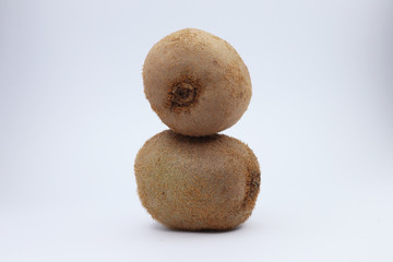 Fototapeta premium juicy kiwi on a white background. funny smiley with fruits