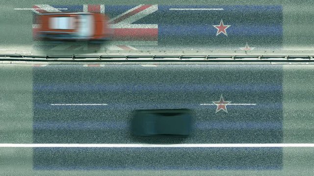 Aerial top down view of cars revealing flag of New Zealand on the road. Traveling related conceptual 3D animation