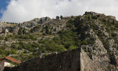 Fototapeta na wymiar Fortress on the mountain in Montenegro. The city of Kotor.