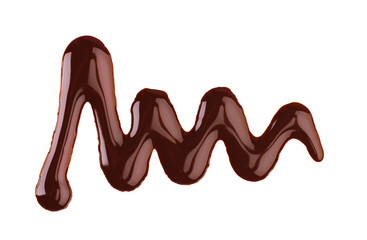 Chocolate syrup drizzle isolated on white background. Splashes of sweet chocolate sauce. Top view.