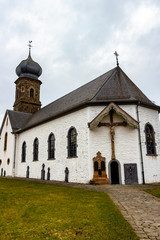 Fototapeta na wymiar St. Martin's Church in Hachiville, Luxembourg, exterior partial view