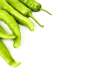 fresh green banana peppers or sweet peppers (capsicum annuum) isolated on a white background