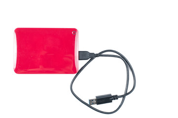 Red external hard with cable isolated on white background.Copy space