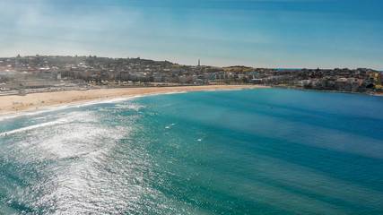 Fototapeta na wymiar Amazing aerial view of Bondi Beach landscape in Sydney, Australia. Drone viewpoint on a sunny morning