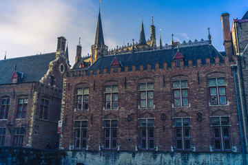 Fototapeta premium Old buildings on canal in Brugges, Belgium.