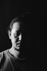 A man closing his eyes to not see And does not perceive something visually In order to eliminate feelings from the mind, blind people