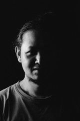 A man's smile that shows insincerity and something in his mind. Which should not be a good thing for sure