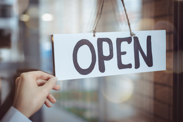 The inscription is open on the door of the restaurant.