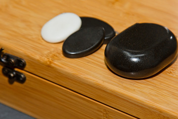 Special, professional set of hot stones for traditional massage. Preparation for the procedure of healing the soul and body.