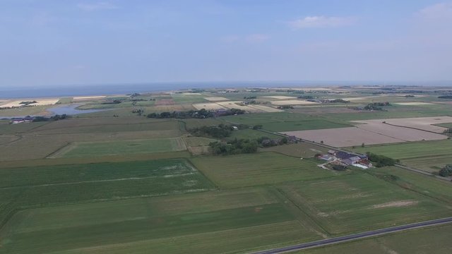 360 degree drone aerial over Pellworm on sunny day 