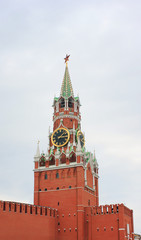 Fototapeta na wymiar Kremlin close up view of Spasskaya Tower in Moscow, Russia. Architecture of the Kremlin Palace on the Red Square 