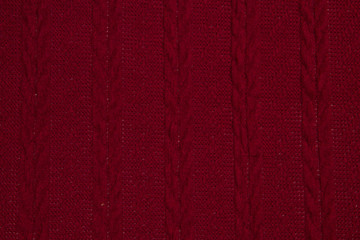 Knitwear knitted  red  background texture.