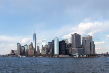 Fototapeta na wymiar New York City Manhattan downtown skyline with skyscrapers illuminated over Hudson River panorama. USA Trade Center.