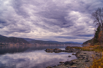 River. Coast. Sky. The clouds. Autumn. The mountains. 