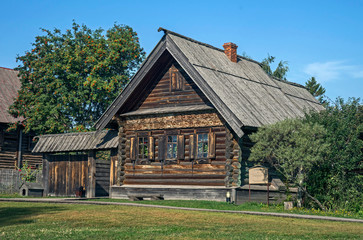 Fototapeta na wymiar Typical old rural house. Museum of wooden architecture, city of Suzdal, XIX century