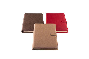 Coffee, brown and red notebooks with magnetic holders