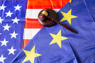 Judge gavel over european and usa flag