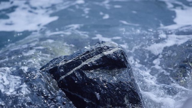 Stone in a rough bay