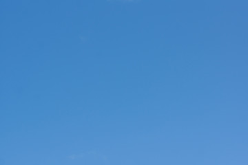 blue sky with light white clouds